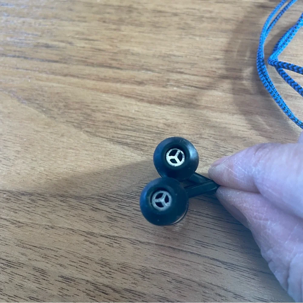 Set of charging cables and earphones with case